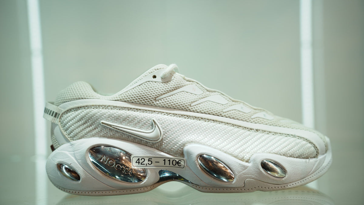 Nike NOCTA Glide Drake (coloris blanc/chrome)